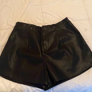 Black high rise faux leather shorts